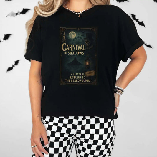 Person wearing a black t-shirt with 'Carnival of Shadows' design, standing against a white background with black bats.
